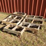 Double hive stands out of reclaimed decking