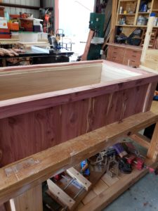 Box covered in cedar